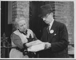 Woman filling in her 1939 Registration